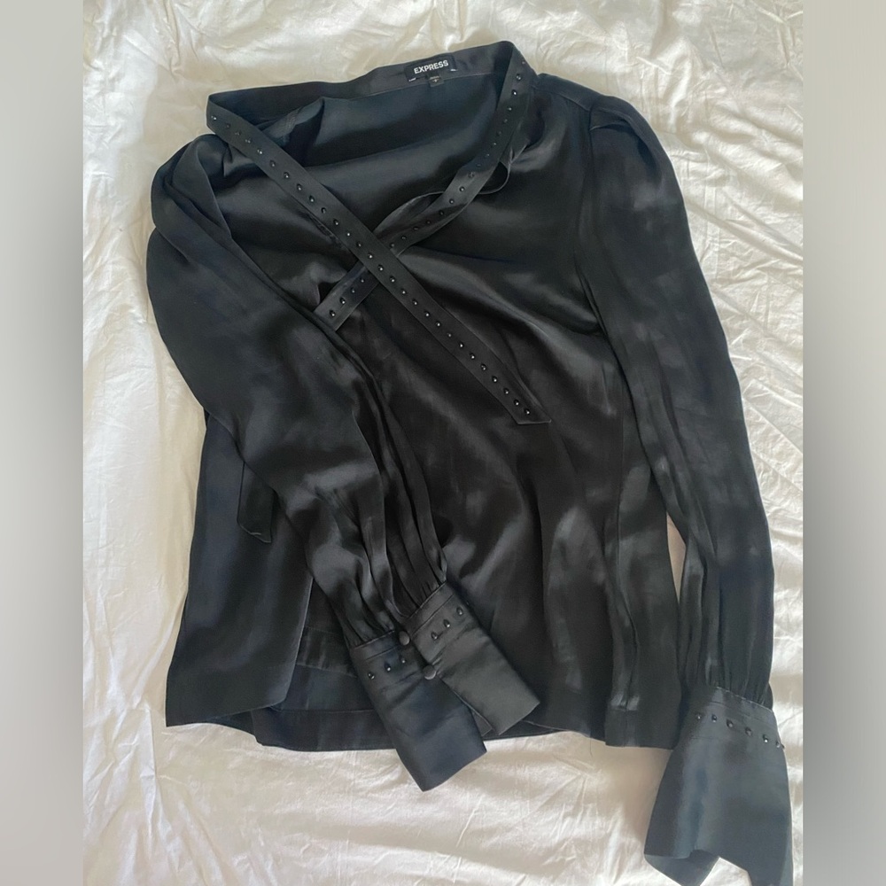 Really cool top with bow and black stud details